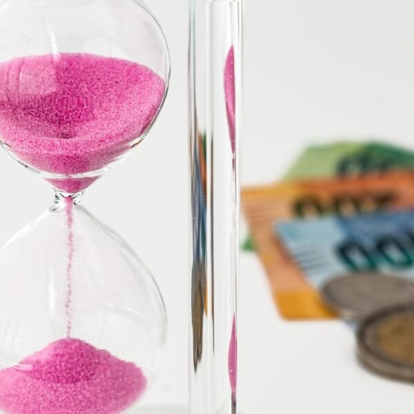 hourglass, money, time; Dollar cost averaging for long-term wealth building