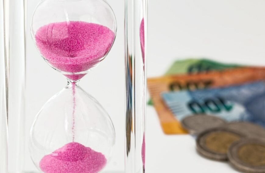 hourglass, money, time; Dollar cost averaging for long-term wealth building